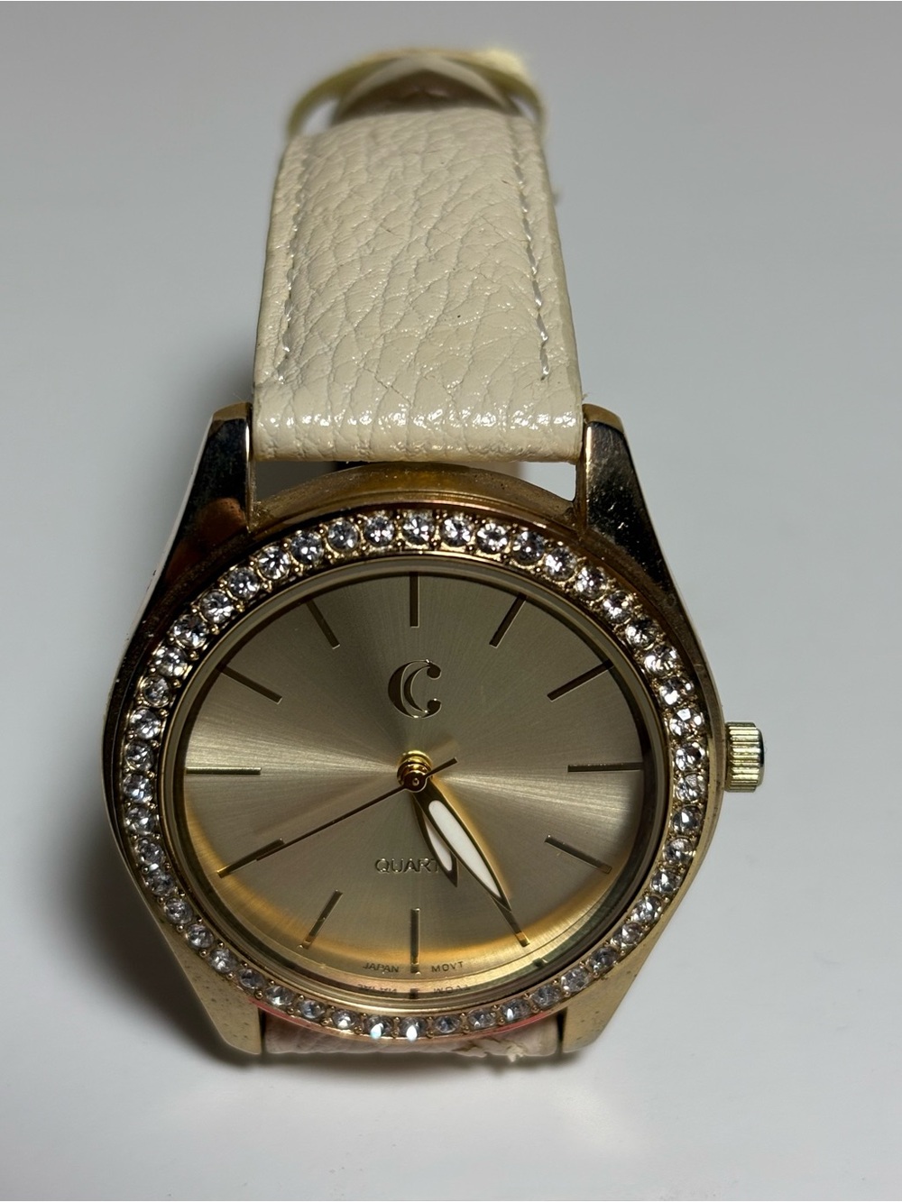 Charming Charlie Gold Crystal Bezel Watch with Cream Leather Strap